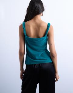 Model wearing Twist shoulder velvet cami in teal