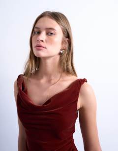 Model wearing Twist shoulder velvet cami mini dress in tabacco