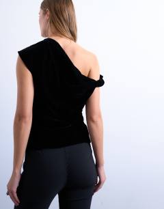 Model wearing Twist shoulder velvet top in black