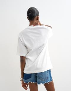 Model wearing Twist tuck tee in white