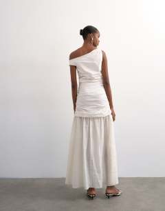 Model wearing Twisted shoulder sheer skirt midi dress in off-white