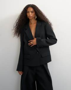 Model wearing Ultimate blazer in black