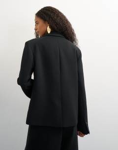 Model wearing Ultimate blazer in black