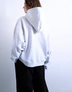 Model wearing Ultimate hoodie in ash grey