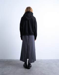 Model wearing Ultimate hoodie in black