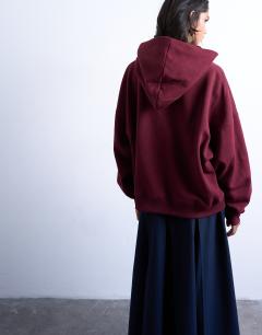 Model wearing Ultimate hoodie in burgundy
