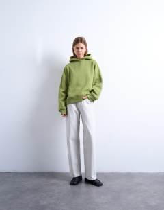 Model wearing Ultimate hoodie in green