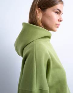 Model wearing Ultimate hoodie in green