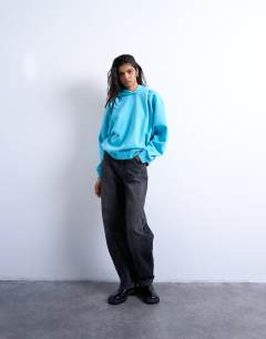 Model wearing Ultimate hoodie in light blue