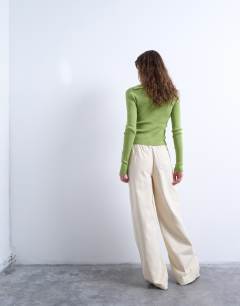 Model wearing Ultimate pull on wide leg trouser in ecru