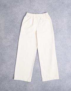 Model wearing Ultimate pull on wide leg trouser in ecru