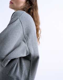 Model wearing Ultimate sweat in dark grey marl