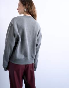 Model wearing Ultimate sweat in dark grey marl