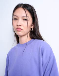 Model wearing Ultimate sweat in purple