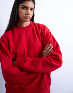 Model wearing Ultimate sweat in red