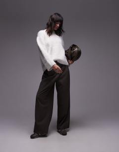 Model wearing Ultra fluffy oversized jumper in ivory