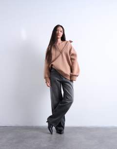 Model wearing Ultra long v-neck polo sweat in brown