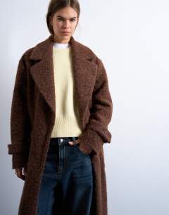Model wearing Unlined soft brushed chuck on longline coat in brown