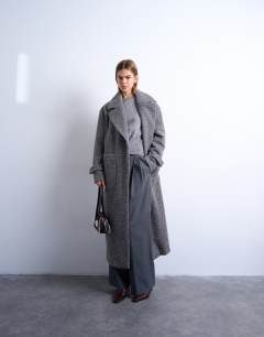 Model wearing Unlined soft brushed chuck on longline coat in charcoal