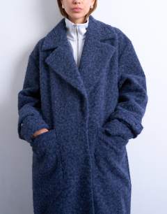 Model wearing Unlined soft brushed chuck on longline coat in navy