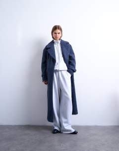 Model wearing Unlined soft brushed chuck on longline coat in navy