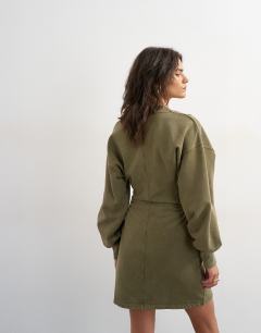 Model wearing V-neck cinch waist sweat mini dress in khaki