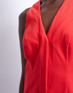 Model wearing V neck clean placket structured mini dress in red