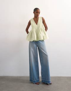 Model wearing V neck pintuck detail a line top in mint