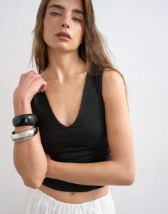 Model wearing V-neck ruched side tank in black