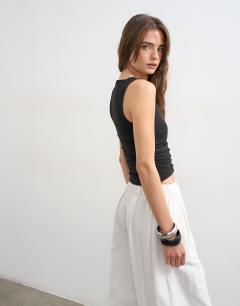 Model wearing V-neck ruched side tank in black