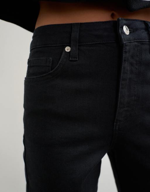 Topshop vaqueros pitillo con abertura lateral en negro liso, 4 de 5
