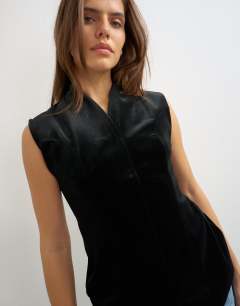 Model wearing Velvet bonded waistcoat in black