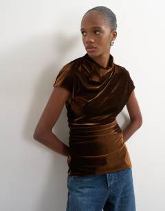 Model wearing Velvet cap sleeve drape front top in chocolate