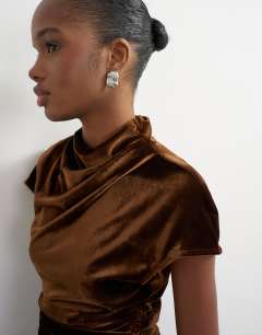 Model wearing Velvet cap sleeve drape front top in chocolate
