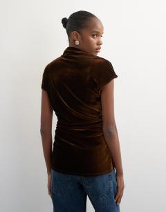 Model wearing Velvet cap sleeve drape front top in chocolate
