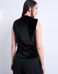 Model wearing Velvet drop armhole ruched side top in black