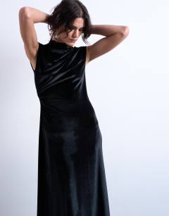 Model wearing Velvet high neck maxi dress in black