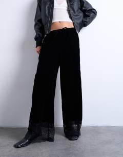 Model wearing Velvet lace insert trouser in black