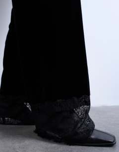 Model wearing Velvet lace insert trouser in black