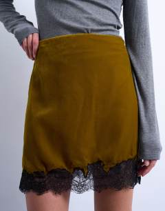 Model wearing Velvet lace mini skirt in olive