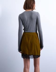 Model wearing Velvet lace mini skirt in olive
