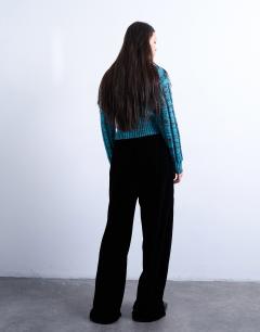 Model wearing Velvet mid rise tie waist wide leg jogger in black