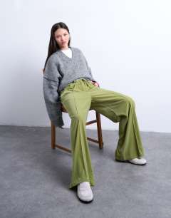 Model wearing Velvet mid rise tie waist wide leg jogger in bright green