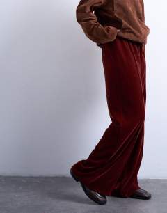Model wearing Velvet mid rise tie waist wide leg jogger in tobacco