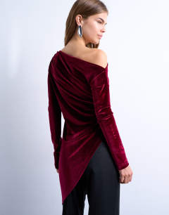 Model wearing Velvet off shoulder tunic long sleeve top in burgundy