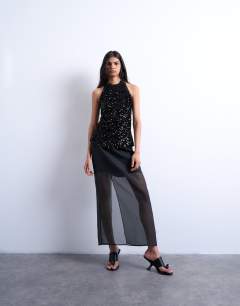 Model wearing Velvet sequin halter top in black