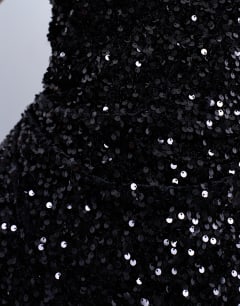 Model wearing Velvet sequin halter top in black