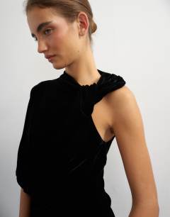 Model wearing Velvet twist top in black
