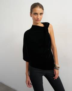 Model wearing Velvet twist top in black