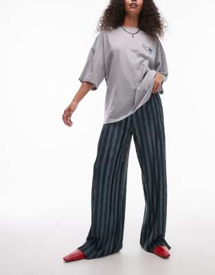 vertical striped plisse wide leg pants in dark green